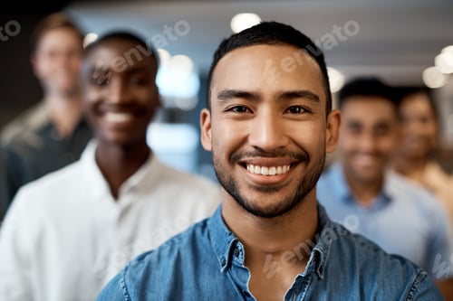 Preview: Portrait of a group of confident young businesspeople working together in a modern office