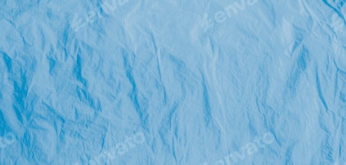 Preview: Blue crumpled paper texture background. Blue old creased and wrinkled paper abstract background.