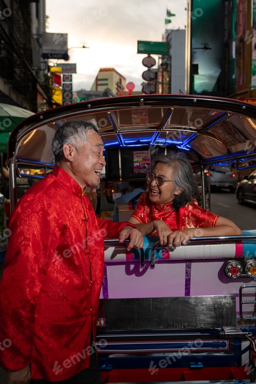 Preview: A happy senior couple in a Chinatown in Bangkok, Thailand,