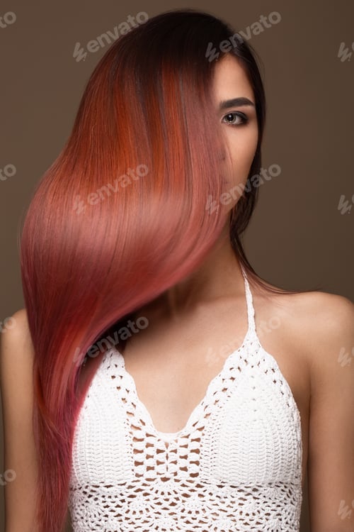 Preview: Beautiful pink-haired girl in move with a perfectly smooth hair, and classic make-up. Beauty face.