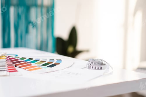 Preview: Color swatch palette and tape measure on table in fashion shop sewing tools and supplies