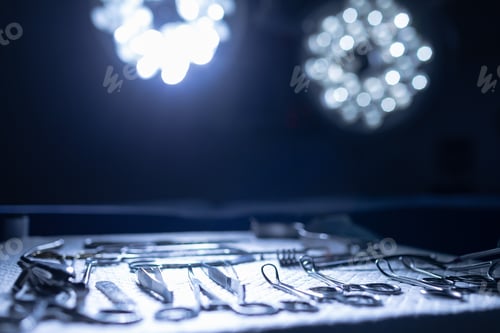 Preview: Front view of surgical instruments on a table in operation theater at hospital