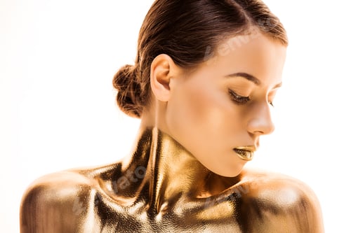 Preview: portrait of nude young woman painted in golden isolated on white