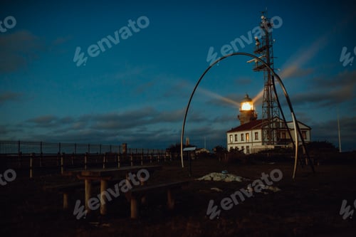 Preview: Road and lighthouse in evening
