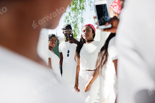 Preview: Stylish african american friends in white