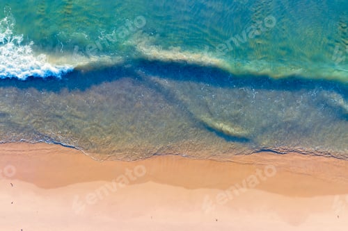 Preview: Top view Surface in tropical sea water wave on beach sand Sunset beach