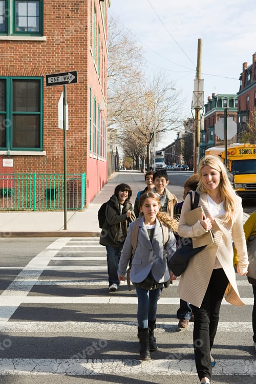 Preview: Teacher and pupils crossing road