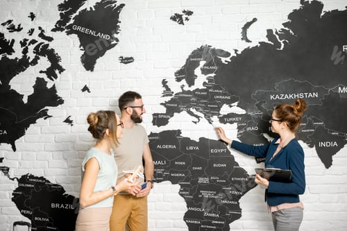 Preview: Couple with travel agent at the office