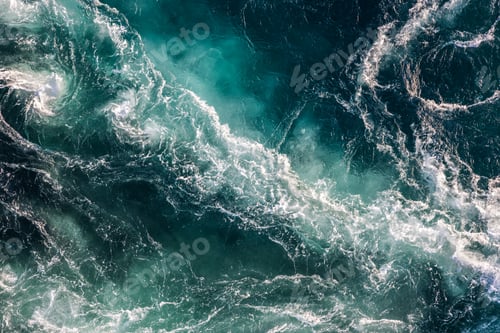 Preview: Blue waves of water of the river and the sea meet each other during high tide and low tide.
