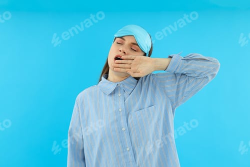 Preview: Beautiful emotional girl on a blue background.