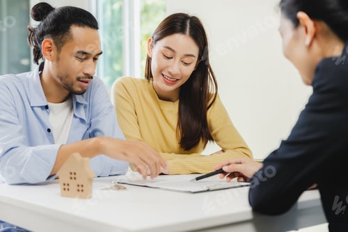 Preview: Real estate agents explain the document for customers before a client signs a contract real estate