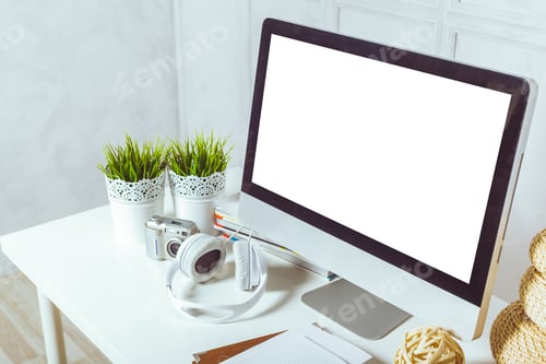 Computer Screen and Desk with Decorative Items