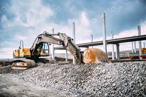 Preview: Industrial machinery on highway construction site
