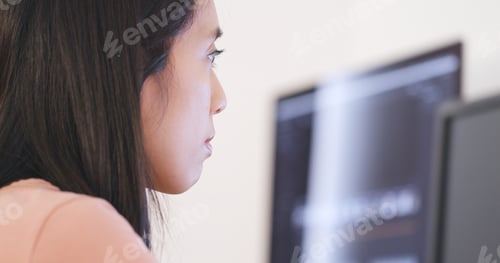 Preview: Woman working on computer