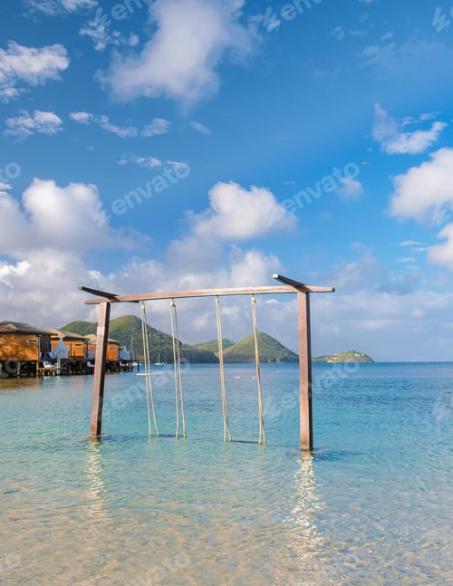 Preview: Swing in the ocean on the Beach of the tropical Island Saint Lucia or St Lucia Caribbean