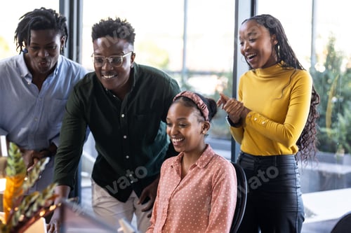 Preview: Team collaborating on project, smiling and discussing ideas in modern office
