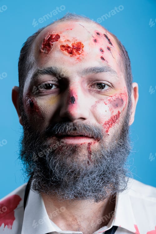 Preview: Portrait of man with bruises, victim of domestic violence, studio background