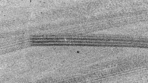 Preview: Aerial top view car tire marks burnout, Tire marks on the asphalt road, Tire mark on race track.