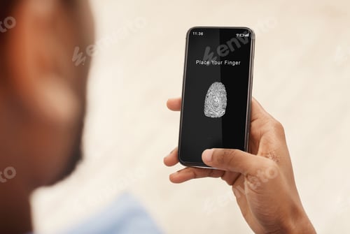 Preview: Man holding phone with fingerprint scanning app