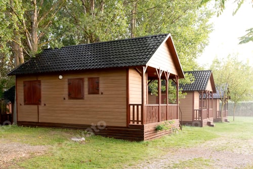 Preview: Prefabricated mobile modular container house in forest camping. Temporary house, forest rest