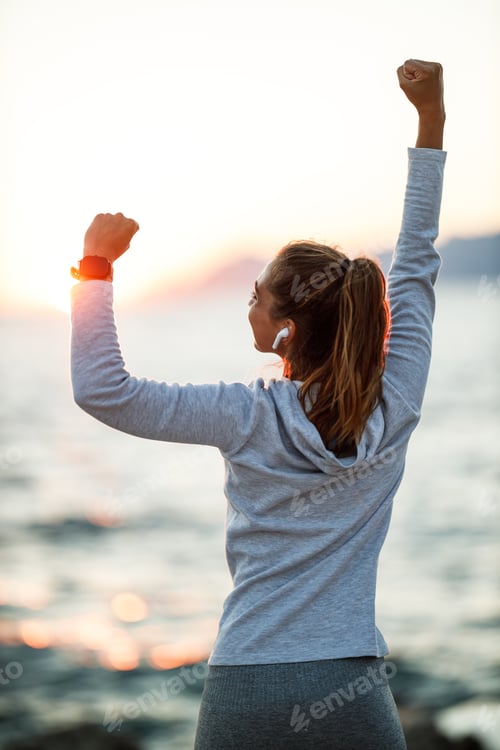 Preview: Woman Enjoying Summer Sunrise And Relaxing During Training Near The Sea