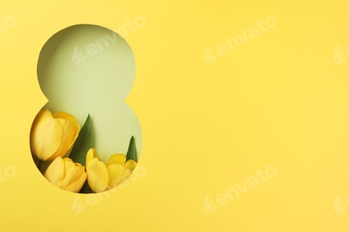 Preview: 8 March greeting card. Paper cut Eight made of yellow background and fresh spring flowers bouquet of