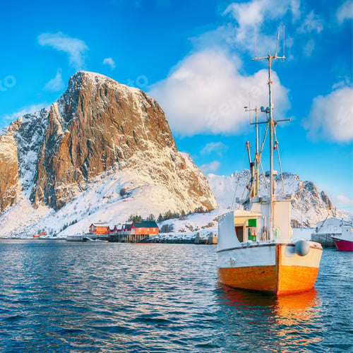 Preview: Amazing winter view on Hamnoy village with port and Festhaeltinden mountain on background.