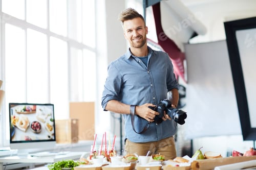 Preview: Handsome Photographer Looking at Camera