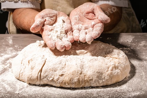 Preview: Photo of flour and women hands with flour. Cooking bread. Kneading the Dough