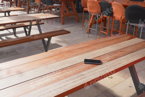 Preview: forget smartphone on a park bench, lost smart phone