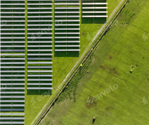 Preview: Solar panels on field in summer, aerial drone view