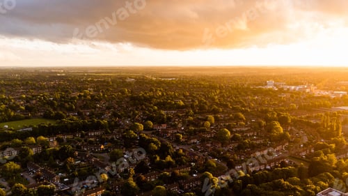 Preview: Aerial drone shot of Welwyn Garden City town in Hertfordshire, England at sunset