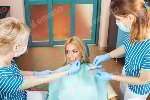 Preview: Young woman bleaching teeth at the dentist