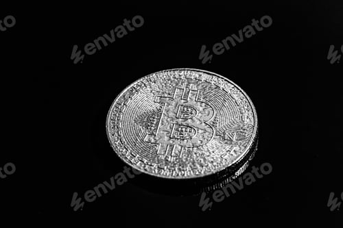 Preview: Bitcoin on black background. The world economic crisis.