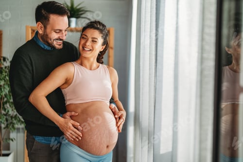 Preview: Man in love hugs his pregnant wife, they are waiting together for the baby's arrival. Love, family