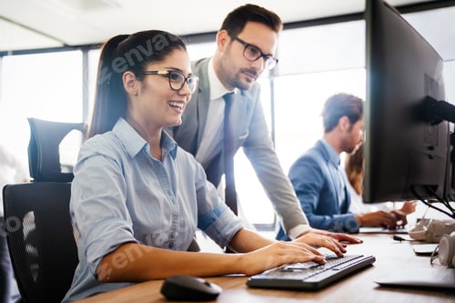 Preview: Programmers cooperating at IT company developing apps