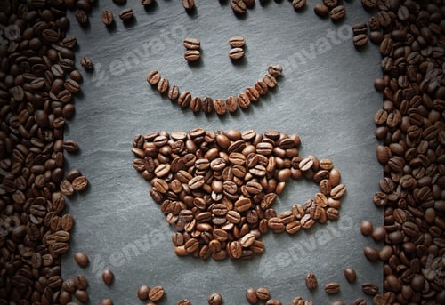 Preview: Smiley face from coffee beans at stone background