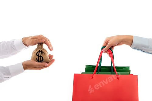 Preview: cropped view of man holding money bag near woman with shopping bags isolated on white