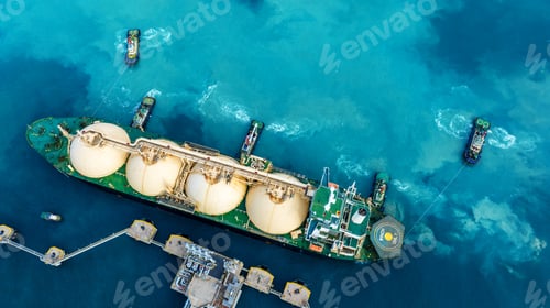 Preview: LNG (Liquefied natural gas) tanker anchored in Gas terminal gas tanks for storage. Oil Crude
