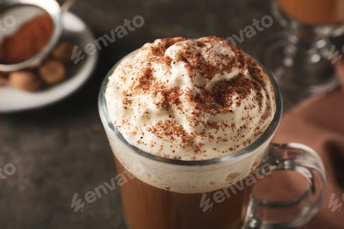 Preview: Hot drink with nutmeg powder in cup, closeup