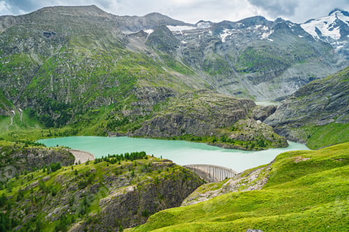Preview: Scenic Mountain Lake in Austria Alps, Kaprun Surrounded by Majestic Peaks and Lush Greenery