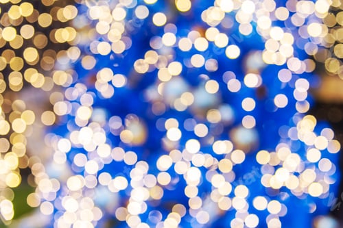 Preview: Golden Christmas Ornament sparkling blurred background. Golden glitter shiny illuminated