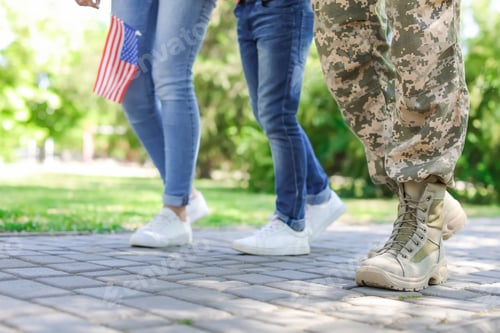 Preview: Male soldier with his family outdoors. Military service