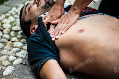 Preview: girl helping an unconscious guy with cpr and cardiac massage
