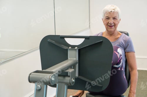 Preview: Active senior adult training at the gym smiling