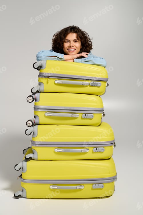 Preview: Joyful journey begins, vibrant woman smiles with stylish luggage stack