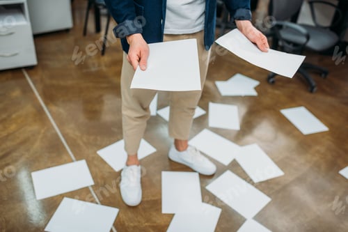Preview: cropped shot of businessman with lot of paperwork
