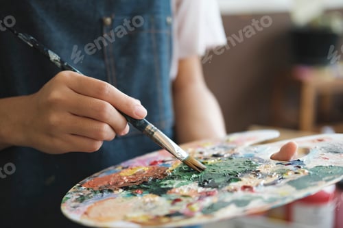 Preview: Crafting Inspiration: Female Artist Sketching and Painting in Workshop