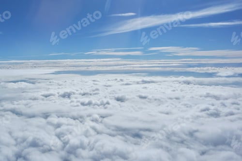 Preview: Light and airy horizon from the airplane window. Earth above the clouds.