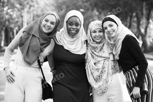 Preview: Group of islamic friends embracing and smiling together